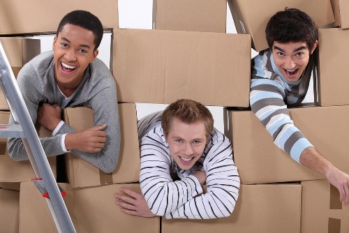 Packing and loading household items into a removal truck