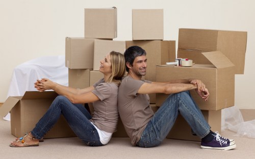 Business furniture being moved through a Kennington office space