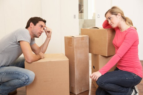 Organised moving boxes ready for collection in a Kennington property