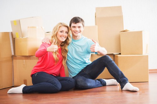 Movers completing a safe final check at the end of a job